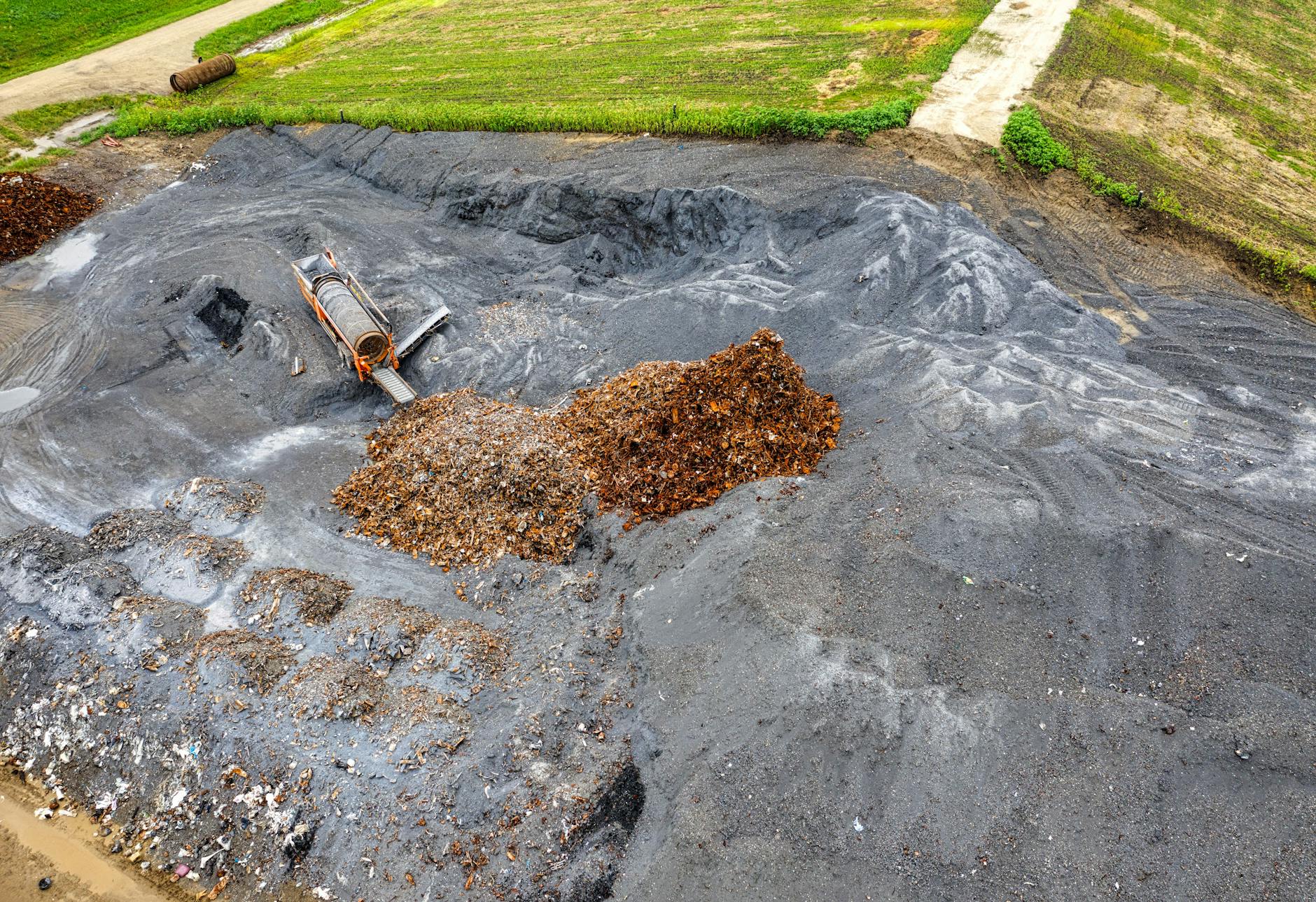 What Is the Environmental Difference Between Composting Food Scraps and Throwing Them in the Trash?