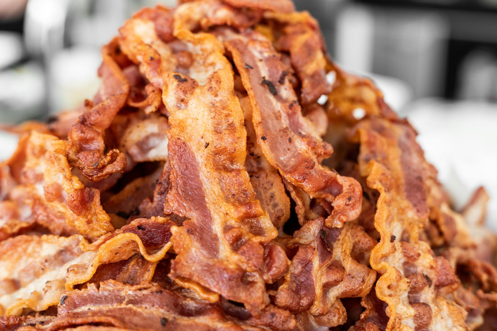 How Long Does Bacon Last in the Fridge? (Opened, Unopened & Cooked)
