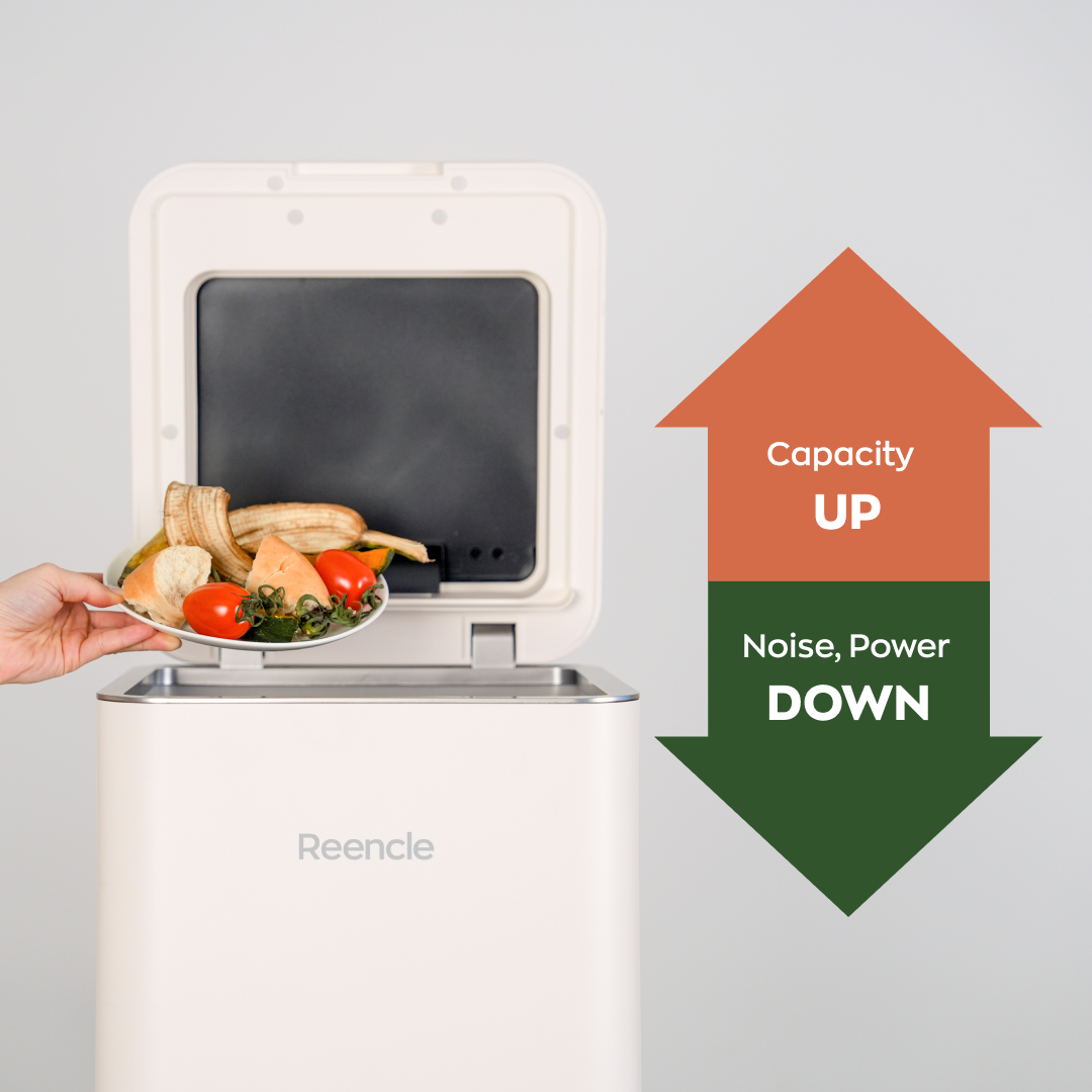 person placing food waste into open white reencle gravity